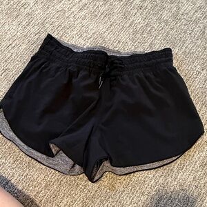Reversible lululemon black/heathered gray shorts 3 inch inseam size